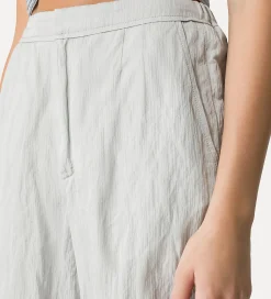 New forte_forte pantaloni flared in cotone crinckle madreperla