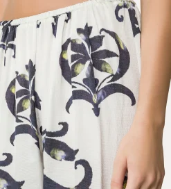 Hot forte_forte pantaloni flared raso “the secret lily” orchidea